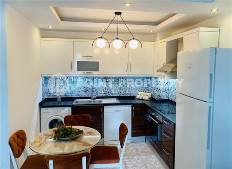 Современные апартаменты 1+1 с площадью 65 м2 в районе Махмутлар, с мебелью-id-3473-фото-3