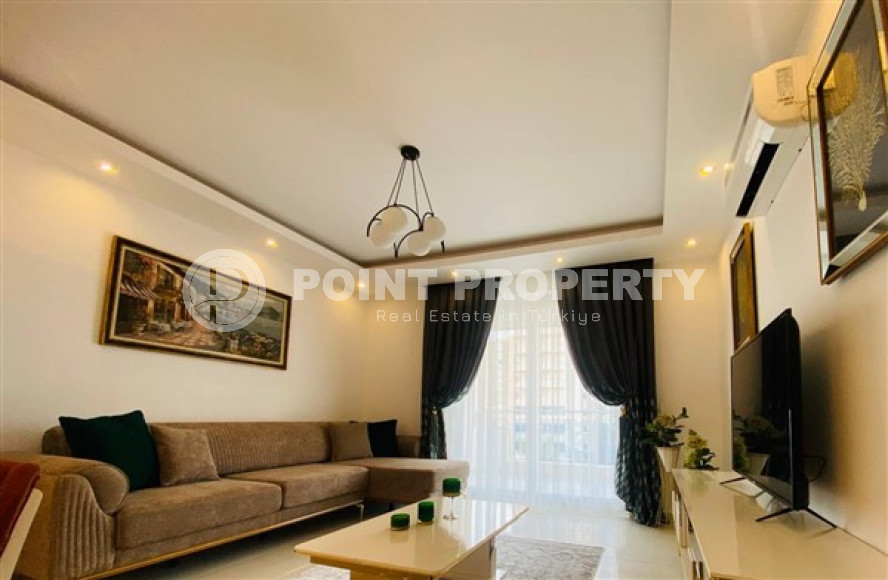 Современные апартаменты 1+1 с площадью 65 м2 в районе Махмутлар, с мебелью-id-3473-фото-4