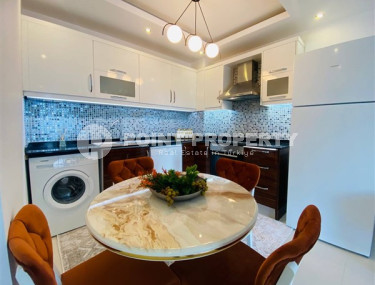 Modern 1+1 apartment with an area of 65 m2 in the Mahmutlar area, furnished-id-3473-photo-5