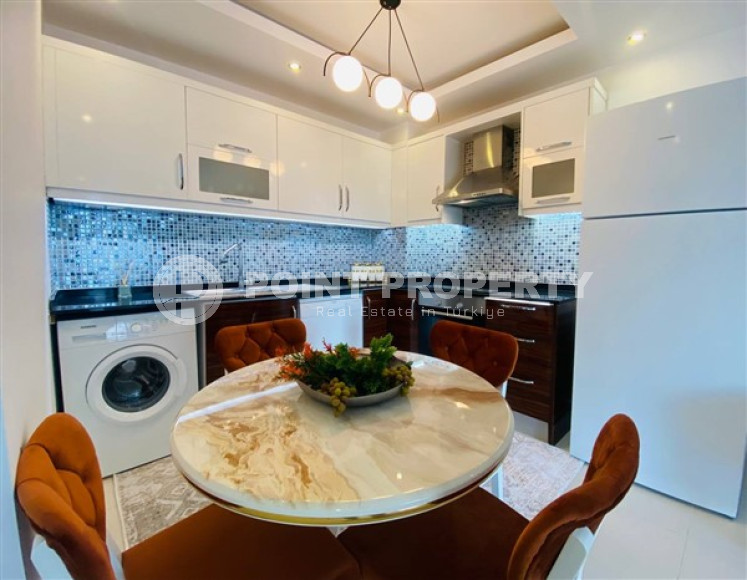 Современные апартаменты 1+1 с площадью 65 м2 в районе Махмутлар, с мебелью-id-3473-фото-5