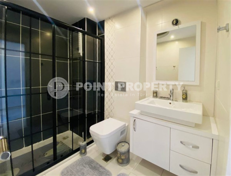 Современные апартаменты 1+1 с площадью 65 м2 в районе Махмутлар, с мебелью-id-3473-фото-7