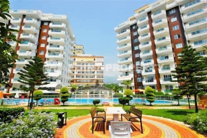 Современные апартаменты 1+1 с площадью 65 м2 в районе Махмутлар, с мебелью-id-3473-фото-11