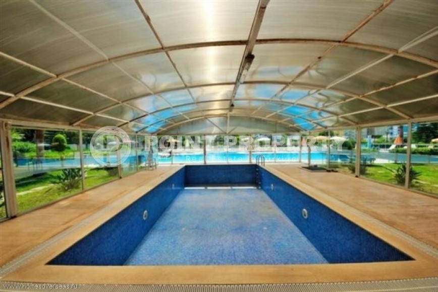 Современные апартаменты 1+1 с площадью 65 м2 в районе Махмутлар, с мебелью-id-3473-фото-17