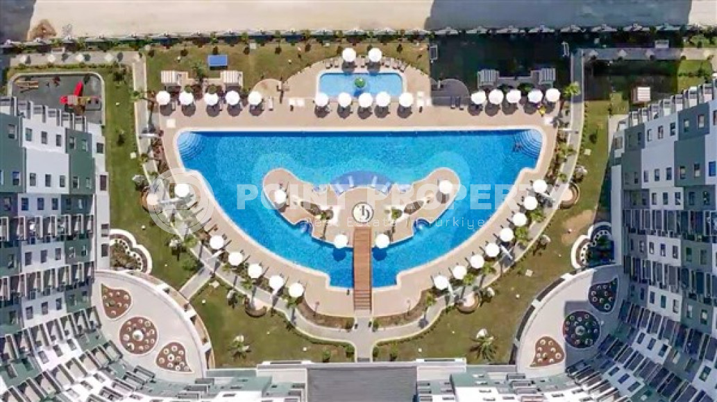 Фешенебельные апартаменты 65 м2 в резиденции с прекрасной инфраструктурой, район Махмутлар-id-3474-фото-3