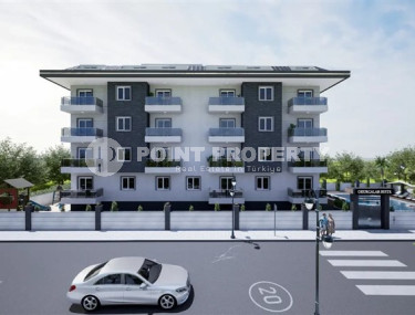 Апартаменты в недорогой ценовой категории с площадью 55 - 140 м2, район Окурджалар, в новом комплексе-id-3477-фото-2