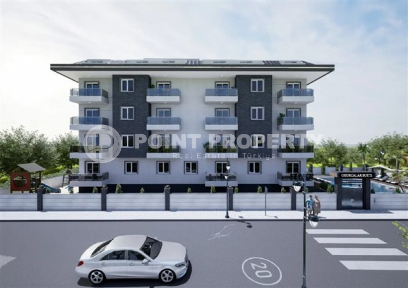 Апартаменты в недорогой ценовой категории с площадью 55 - 140 м2, район Окурджалар, в новом комплексе-id-3477-фото-2