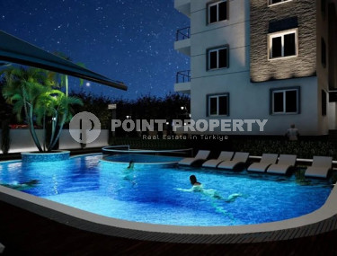 Апартаменты в недорогой ценовой категории с площадью 55 - 140 м2, район Окурджалар, в новом комплексе-id-3477-фото-4