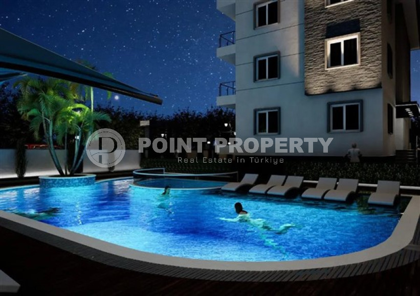 Апартаменты в недорогой ценовой категории с площадью 55 - 140 м2, район Окурджалар, в новом комплексе-id-3477-фото-4