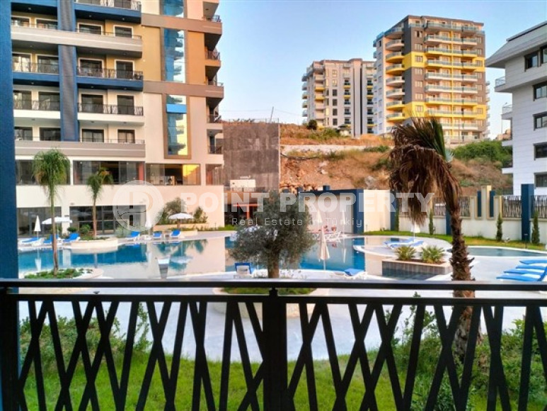 Классическая квартира 1+1 в новом комплексе 2022 года, район Махмутлар-id-3483-фото-8