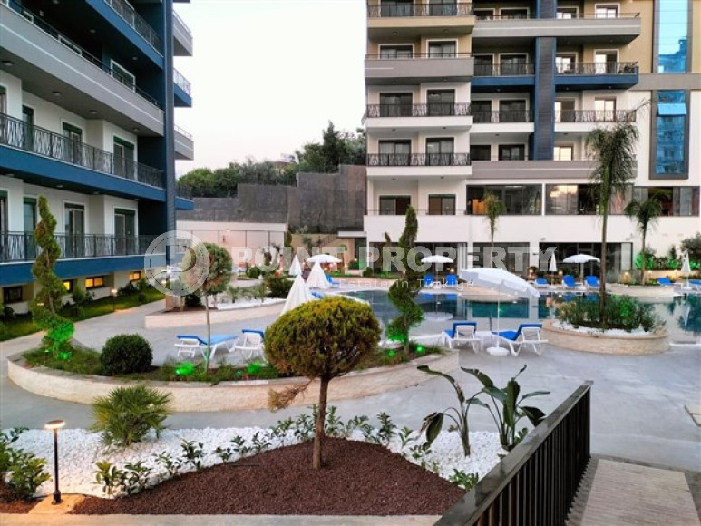 Классическая квартира 1+1 в новом комплексе 2022 года, район Махмутлар-id-3483-фото-13