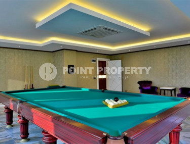 Уютные двухкомнатные апартаменты 1+1 возле моря, район Махмутлар-id-3485-фото-4