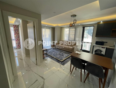 Comfortable small apartment 55 m2, center of Alanya, in a new residence 2021-id-3488-photo-1