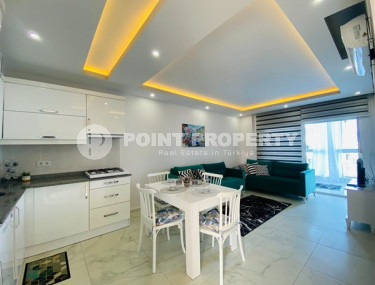 Недорогие апартаменты 1+1 с площадью 65 м2 всего в 350 метрах от моря, район Махмутлар-id-3495-фото-2