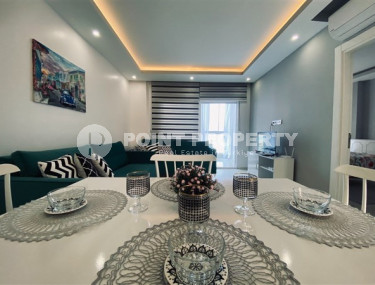 Недорогие апартаменты 1+1 с площадью 65 м2 всего в 350 метрах от моря, район Махмутлар-id-3495-фото-3