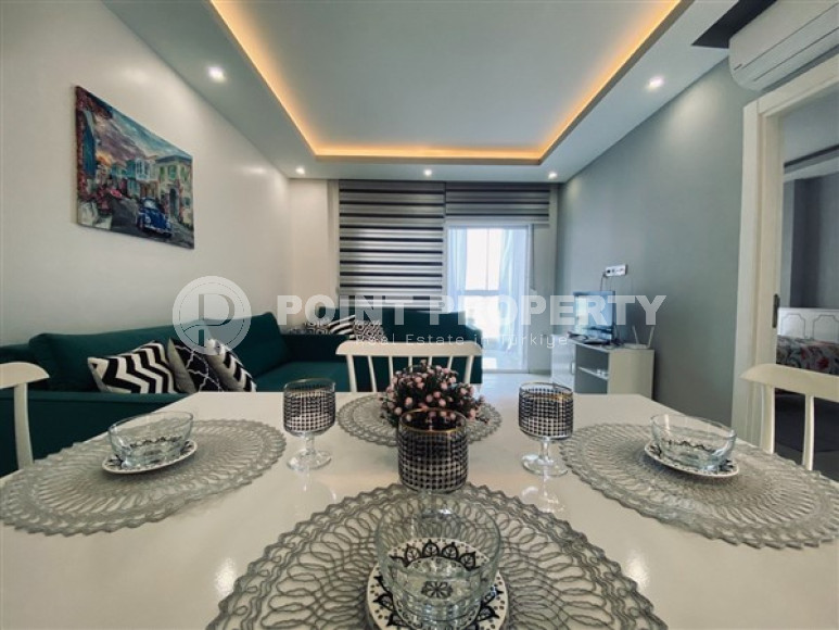 Недорогие апартаменты 1+1 с площадью 65 м2 всего в 350 метрах от моря, район Махмутлар-id-3495-фото-3