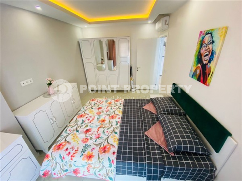 Недорогие апартаменты 1+1 с площадью 65 м2 всего в 350 метрах от моря, район Махмутлар-id-3495-фото-6