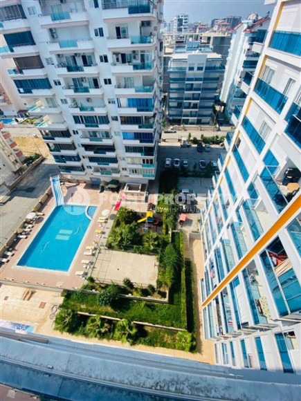 Недорогие апартаменты 1+1 с площадью 65 м2 всего в 350 метрах от моря, район Махмутлар-id-3495-фото-18