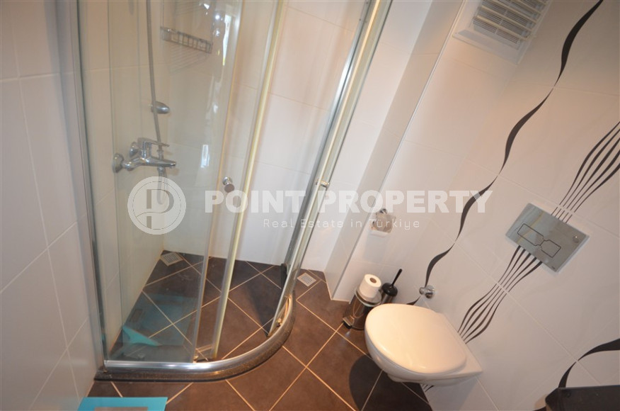 Spacious apartment with a 2+1 layout and an area of 90 m2 in a complex with a private pool and garden in the Oba area, 250 meters from the sea-id-1309-photo-12