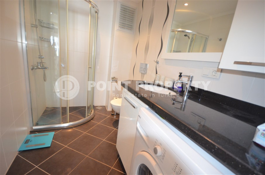 Spacious apartment with a 2+1 layout and an area of 90 m2 in a complex with a private pool and garden in the Oba area, 250 meters from the sea-id-1309-photo-13