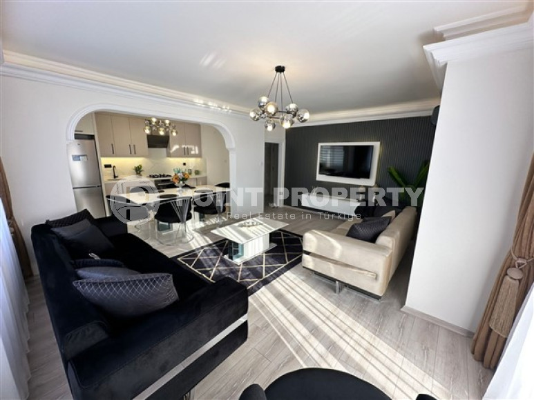 Three-room apartment with furniture in the Mahmutlar area, with an area of 120 m2-id-3507-photo-1