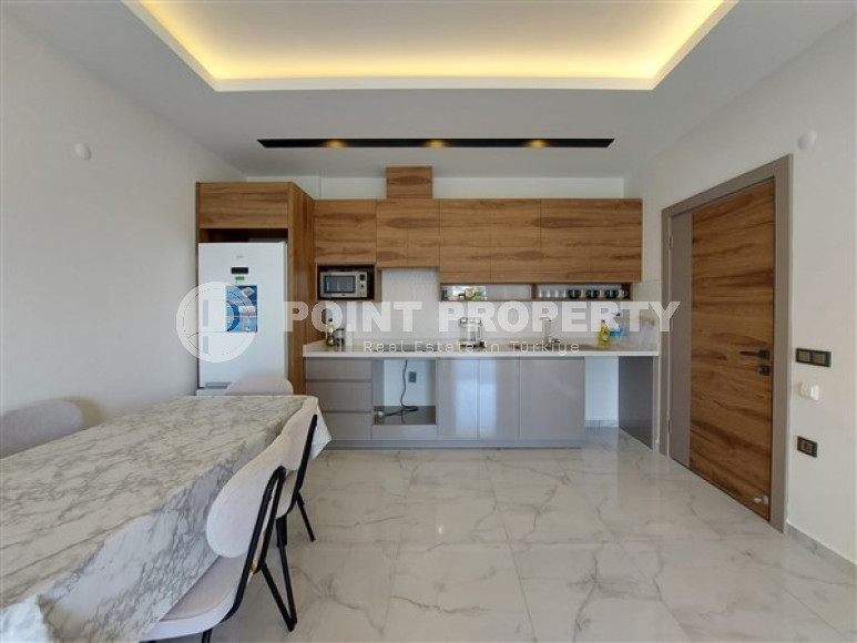 Апартаменты 2+1 в высотной резиденции 2021 года постройки с хорошей инфраструктурой, район Махмутлар-id-3508-фото-4