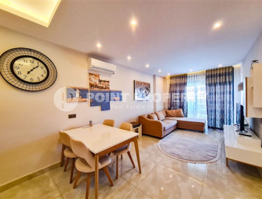 Апартаменты 1+1 в ультрасовременном жилом комплексе на берегу моря в центре района Махмутлар-id-3516-фото-2