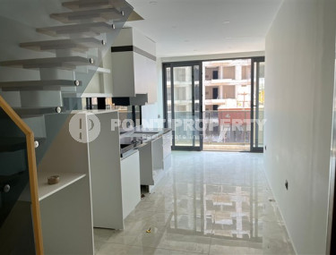 Небольшая двухуровневая квартира 50 м2 на первой линии моря, район Махмутлар-id-3520-фото-2