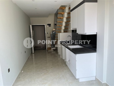 Небольшая двухуровневая квартира 50 м2 на первой линии моря, район Махмутлар-id-3520-фото-3