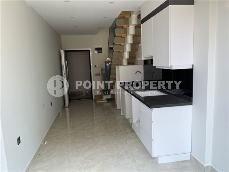 Небольшая двухуровневая квартира 50 м2 на первой линии моря, район Махмутлар-id-3520-фото-3