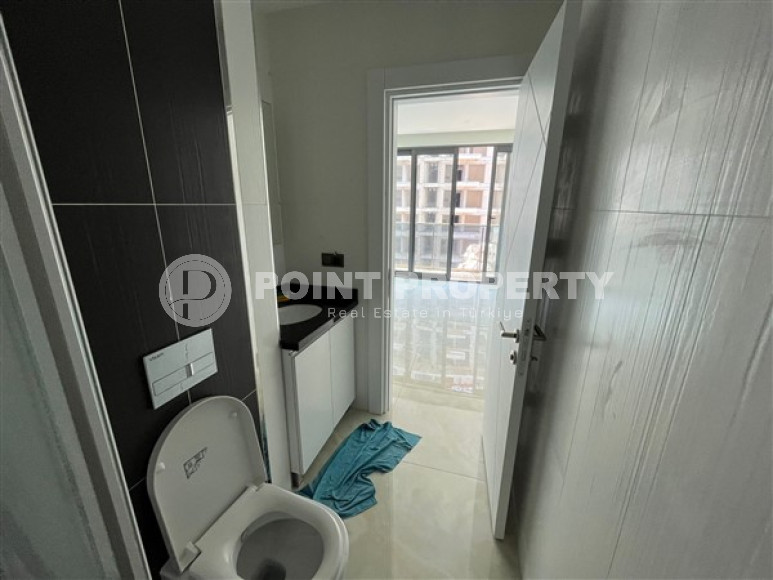 Небольшая двухуровневая квартира 50 м2 на первой линии моря, район Махмутлар-id-3520-фото-4