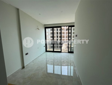 Небольшая двухуровневая квартира 50 м2 на первой линии моря, район Махмутлар-id-3520-фото-5