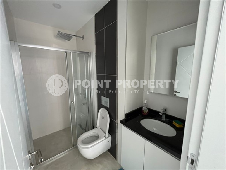 Небольшая двухуровневая квартира 50 м2 на первой линии моря, район Махмутлар-id-3520-фото-6