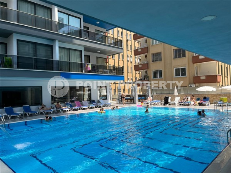 Небольшая двухуровневая квартира 50 м2 на первой линии моря, район Махмутлар-id-3520-фото-8