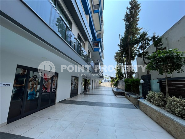 Небольшая двухуровневая квартира 50 м2 на первой линии моря, район Махмутлар-id-3520-фото-9