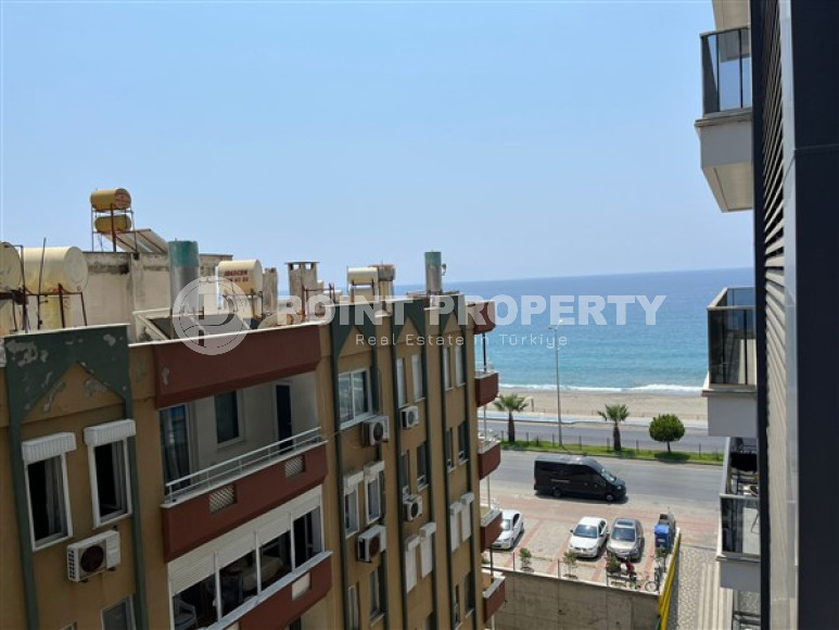 Небольшая двухуровневая квартира 50 м2 на первой линии моря, район Махмутлар-id-3520-фото-15