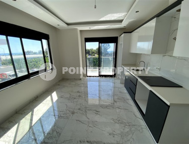 Новая уютная квартира 1+1 в 100 метрах от моря в районе Каргыджак.-id-3536-фото-2