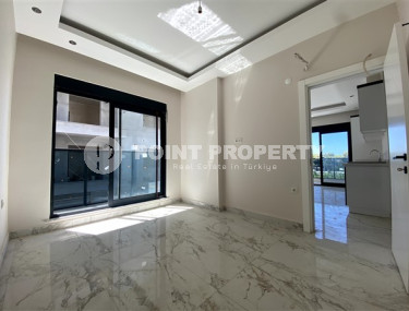 Новая уютная квартира 1+1 в 100 метрах от моря в районе Каргыджак.-id-3536-фото-4