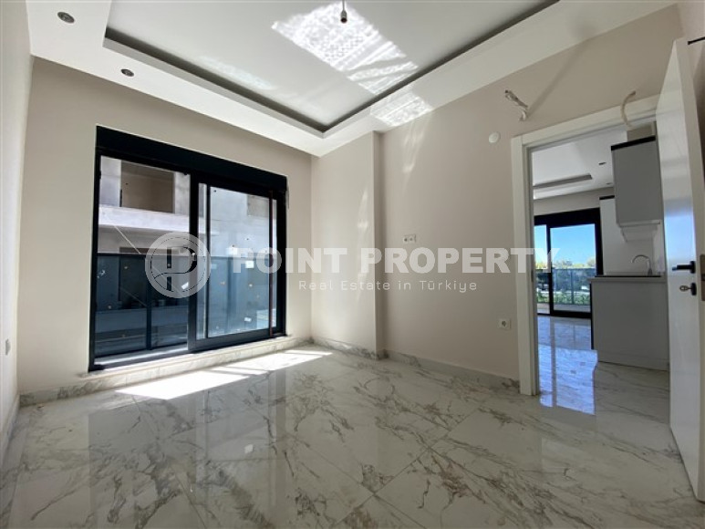 Новая уютная квартира 1+1 в 100 метрах от моря в районе Каргыджак.-id-3536-фото-4