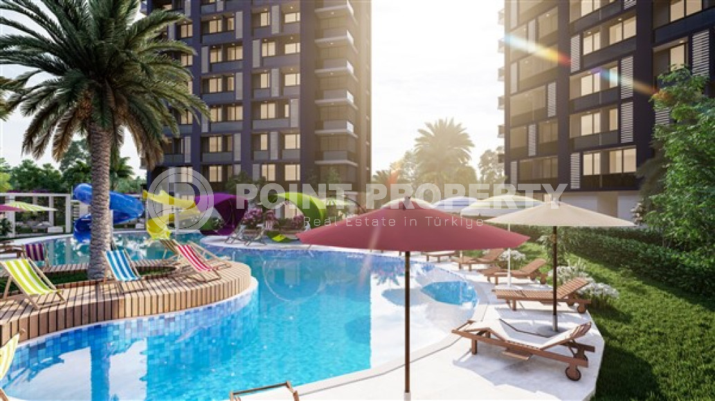 Apartments 56 - 76 m2 at the foundation pit stage in a high-rise residence of three blocks under construction, Mersin-id-3544-photo-10