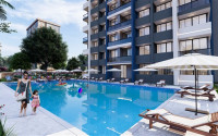 Apartment with an area of 62 m2 in a high-rise building under construction in the city of Mersin. Location on floors 0 to 12 to choose from.-id-3546-photo-12