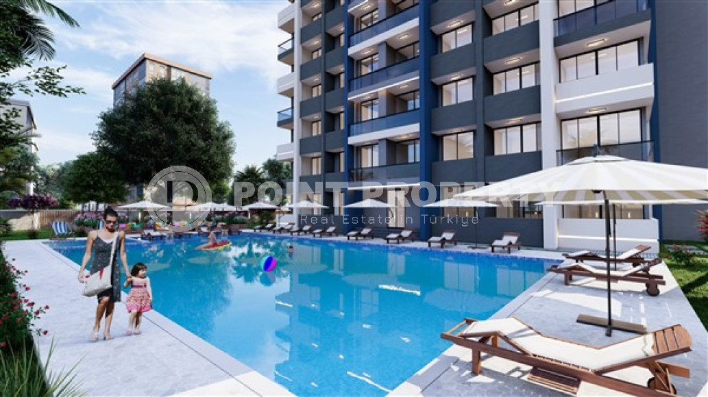 Apartment with an area of 62 m2 in a high-rise building under construction in the city of Mersin. Location on floors 0 to 12 to choose from.-id-3546-photo-12