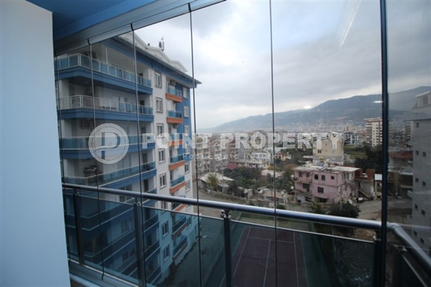 Обустроенные апартаменты 65 м2 с просторным остекленным балконом, район Тосмур-id-3549-фото-4