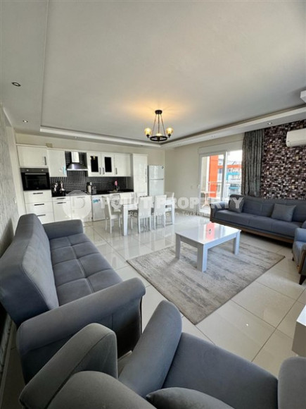 Квартира 1+1 в центре района Кестель в 150 метрах от моря.-id-3553-фото-1