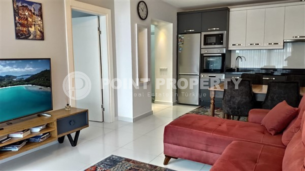 Квартира 1+1 с хорошим стильным ремонтом в пешей доступности до моря и центра района Каргыджак.-id-3554-фото-2