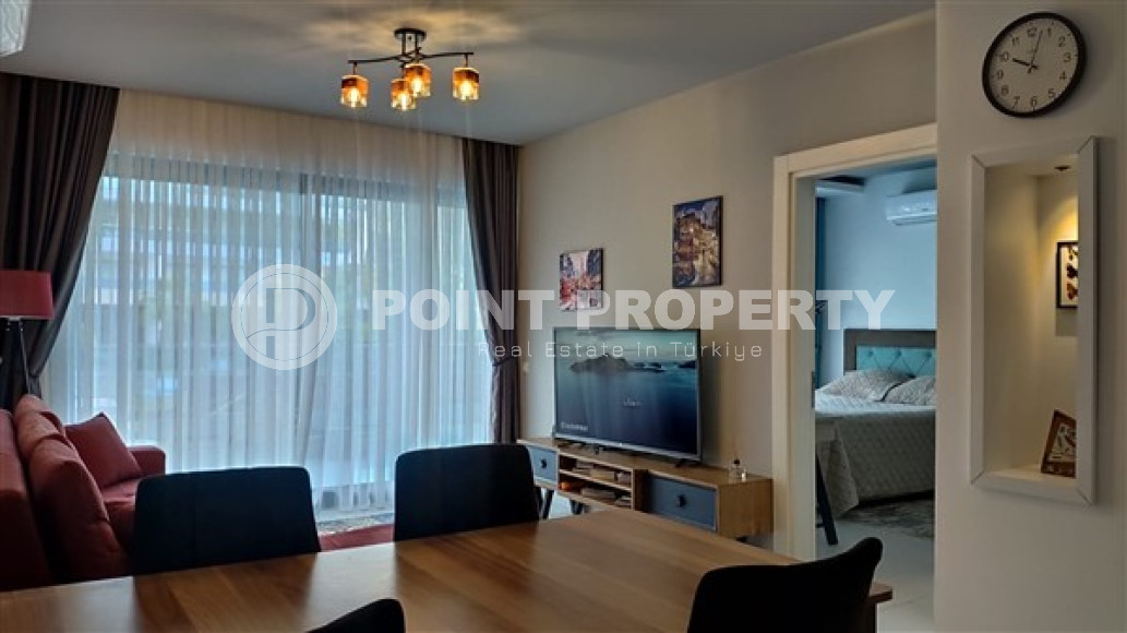 Квартира 1+1 с хорошим стильным ремонтом в пешей доступности до моря и центра района Каргыджак.-id-3554-фото-3