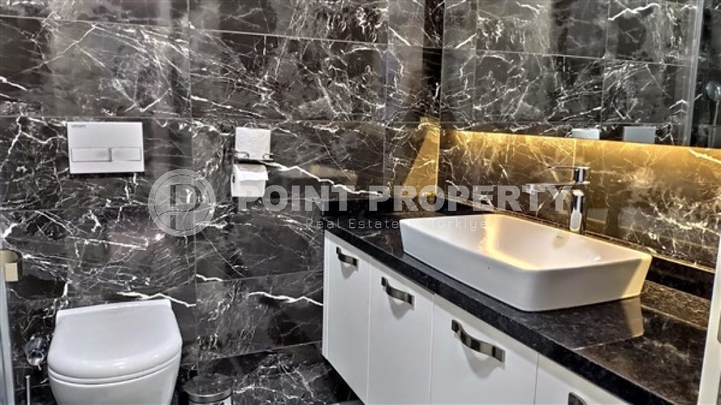 Квартира 1+1 с хорошим стильным ремонтом в пешей доступности до моря и центра района Каргыджак.-id-3554-фото-6