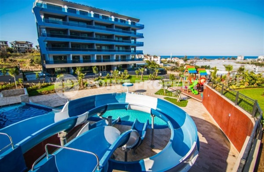 Квартира 1+1 с хорошим стильным ремонтом в пешей доступности до моря и центра района Каргыджак.-id-3554-фото-9