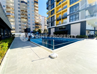 Квартира с планировкой 2+1 на 4 этаже комплекса с отличной инфраструктурой, район Махмутлар-id-3562-фото-2