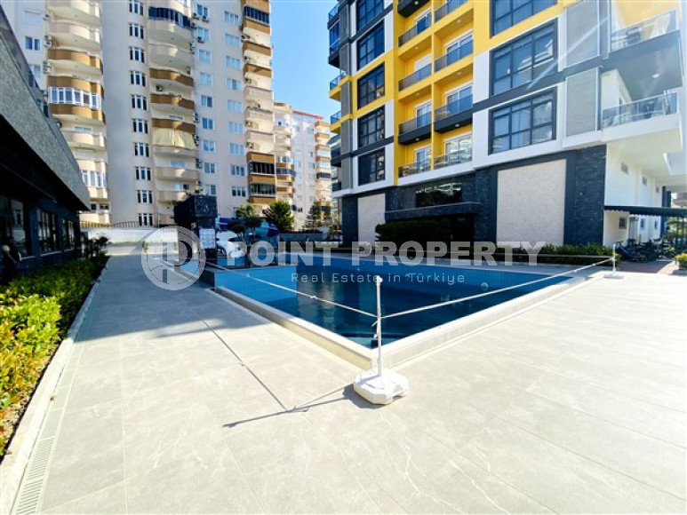 Квартира с планировкой 2+1 на 4 этаже комплекса с отличной инфраструктурой, район Махмутлар-id-3562-фото-2