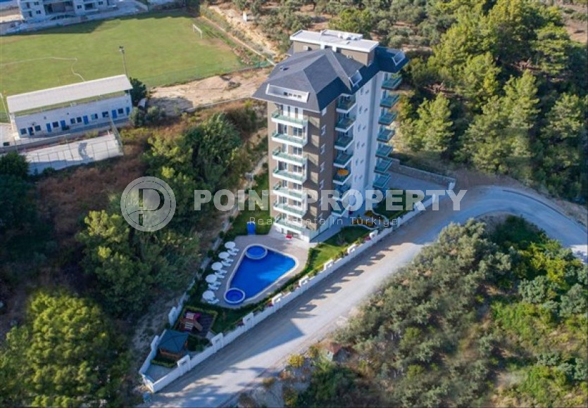 Апартаменты 1+1 в новом жилом комплексе в районе Авсаллар.-id-3573-фото-11